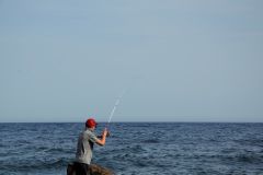 Pesca con ca�a ligera en el mar